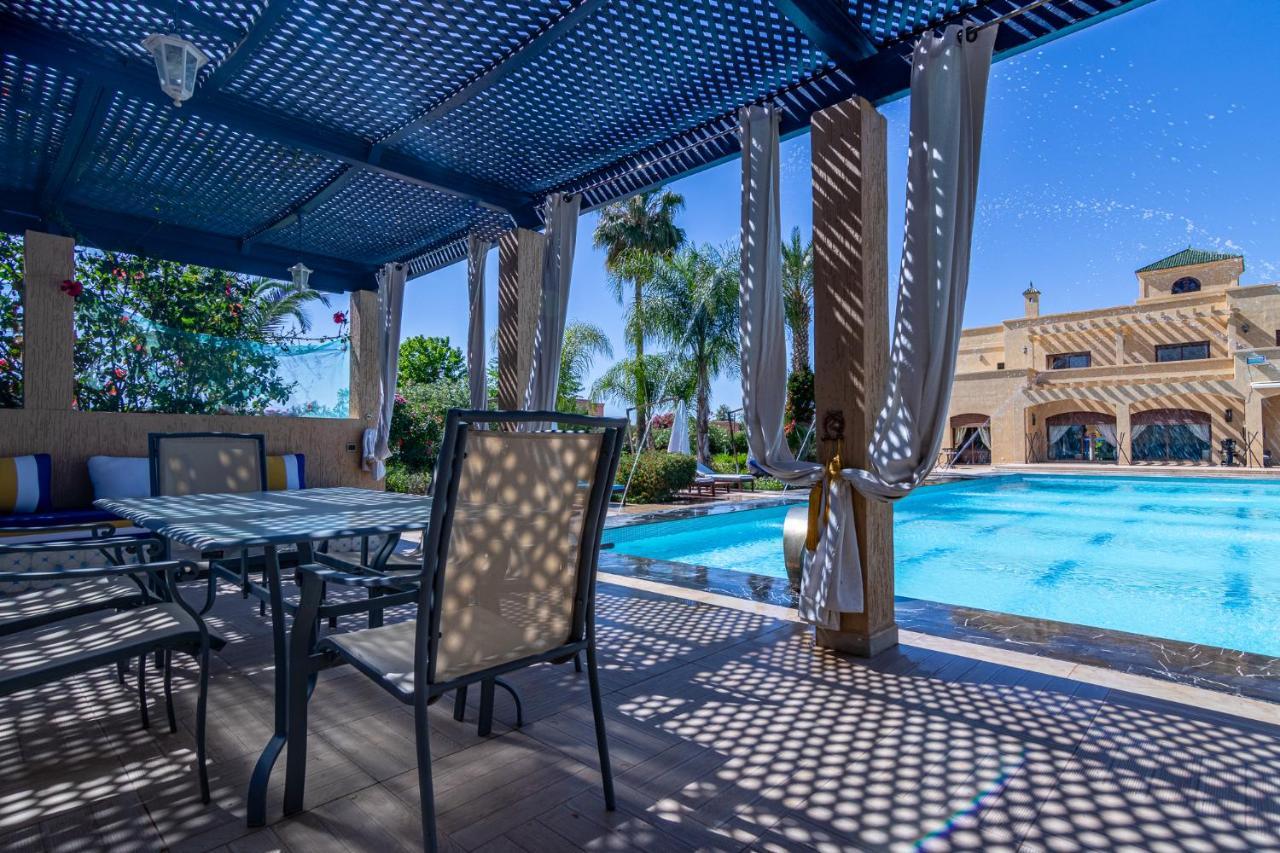 Palais Les Sources De L'Atlas & Spa El Harkat Bagian luar foto